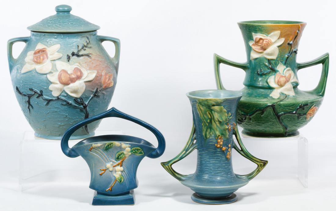 Roseville Pottery Assortment: Roseville Pottery Assortment Four pieces including 'Apple Blossom' 2-8 cookie jar, 'Snowberry' 18K-7, 'Bushberry' 34-8 and 'Magnolia' 93-9 Height: 9.00 inches (tallest) Category: Pottery & Porcelain >