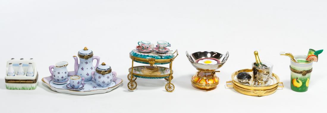 Limoges Trinket Box Assortment: Limoges Trinket Box Assortment Six items including serving cart, champagne tray, milk carton with box, fried egg in pan with box, beverage with box and seven piece tea service Height: 3.00 inches (ser