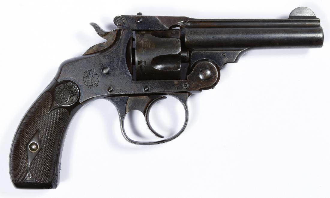 Smith and Wesson .32 S&W Cal. Revolver (Serial #326984): Smith and Wesson .32 S&W Cal. Revolver (Serial #326984) c.1910 having original box, fifth model top-break five-round double action revolver, blue steel with bakelite grips Length: 3.00 inches (barrel