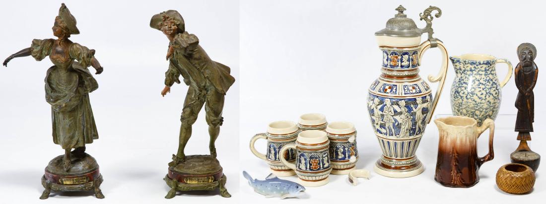 Colin Maillard (French, 20th Century) Metal Statues: Colin Maillard (French, 20th Century) Metal Statues Two statues of 18th century style male and female figures with name plaque on marble and metal footed bases; together with German pottery pitcher an