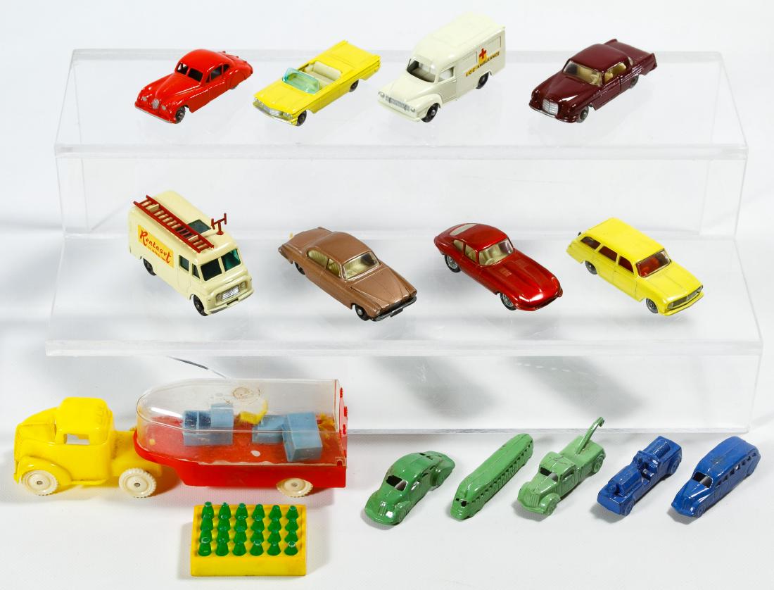 Matchbox Car Assortment: Matchbox Car Assortment Eight cars including No. 14, 28, (2) 32, 38, 39, 53 and 62; together with an plastic toy truck by Allied, plastic Coca-Cola bottles and (4) tootsie toys Length: 5.75 inches (tr