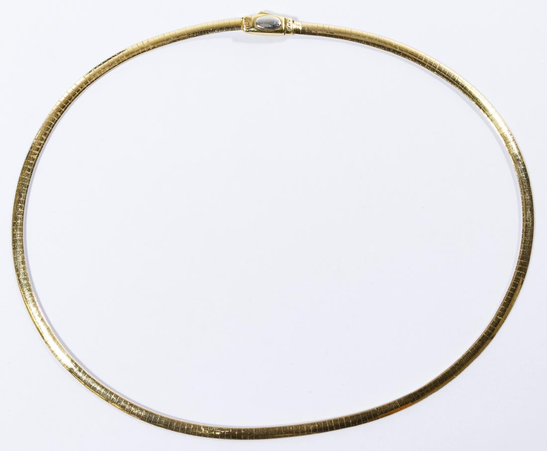 14k White / Yellow Gold Omega Link Necklace: 14k White / Yellow Gold Omega Link Necklace Double sided necklace having white gold on one side and yellow gold on the other measuring approximately 4mm in width; marked '14k' near clasp Length: 16.75