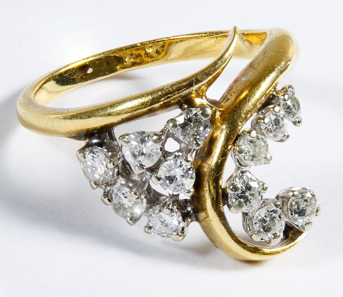 10k Gold and Diamond Ring: 10k Gold and Diamond Ring Having twelve round cut diamonds weighing approximately 0.80CTtw; marked '10k' inside band Size: 6 Weight: 2.89 dwts. (total weight) Category: Fine Jewelry > 10k Gold Shippin