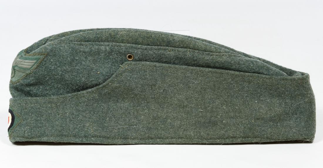 World War II German Army Enlisted Mans Cap: World War II German Army Enlisted Mans Cap Having a eagle on the front, marked 'M. Mochler & Sohne Mutzenfabrik Berlin 1943' on the inside Length: 11.00 inches Category: Military & Weapons > World War