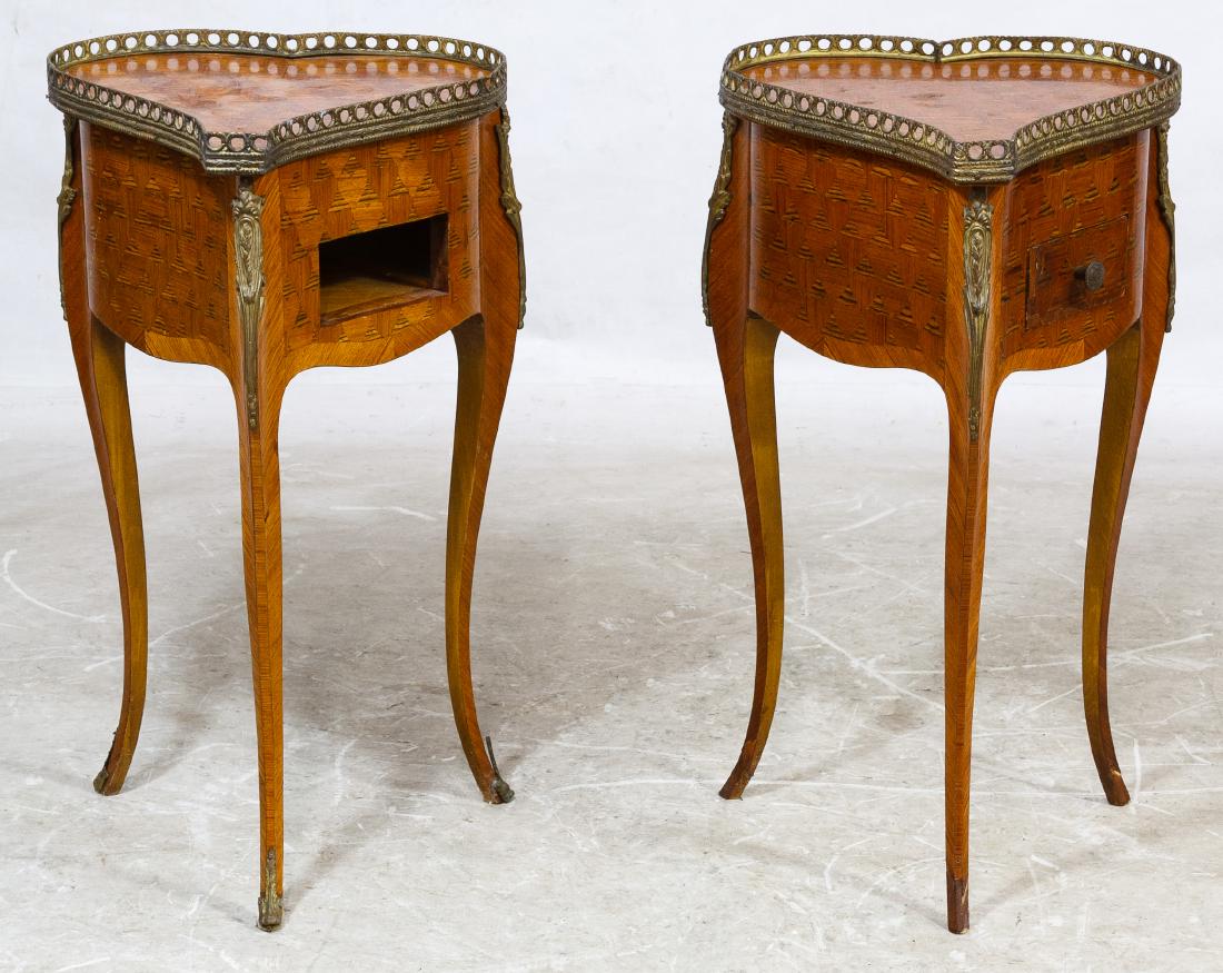 French Marquetry Heart Shaped Tables: French Marquetry Heart Shaped Tables Two matching hinged-top tables with brass tone metal gallery, leg and foot edge protectors and one side drawer Height: 27.00 inches, Width: 15.00 inches, Depth: 15