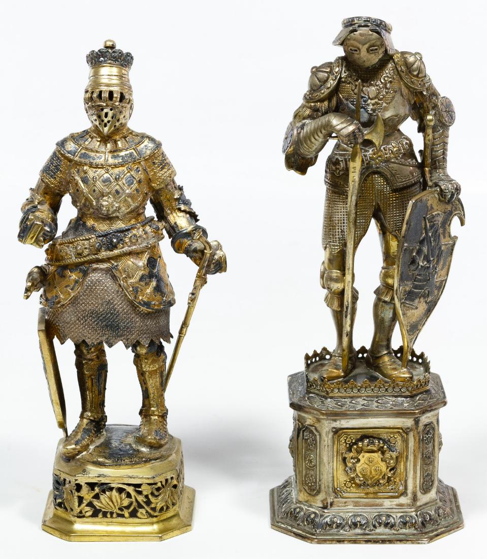 Sterling Silver Knight Suit of Armor Figurines: Sterling Silver Knight Suit of Armor Figurines Two figures of full suits of armor; one marked on the back '925', 'sterling' and 'Germany' Height: 10.25 inches (tallest) Weight: 47.58 ozt. Category: Si