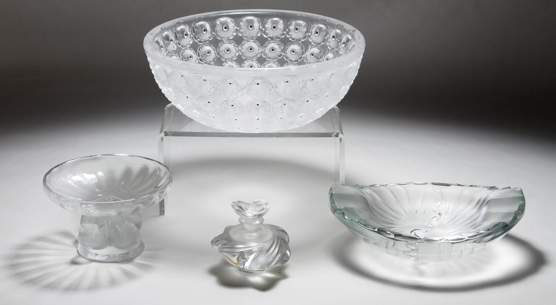 Lalique Crystal Assortment: Lalique Crystal Assortment Four signed items including a 'Nemours' bowl, a perfume bottle, a footed dove compote and a Nancy shell dish Height: 4.00 inches, Diameter: 10.00 inches (Nemours bowl) Categ