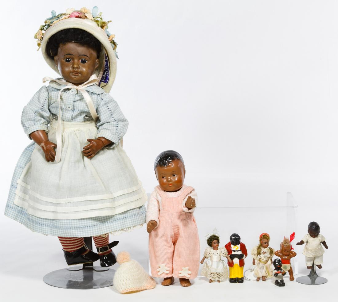 Black Doll Assortment: Black Doll Assortment Including a bisque socket head possibly by Cuno, Otto & Dressel with composition body, a composition baby doll, (3) bisque dollhouse dolls, a bisque figurine, a plastic Indian an