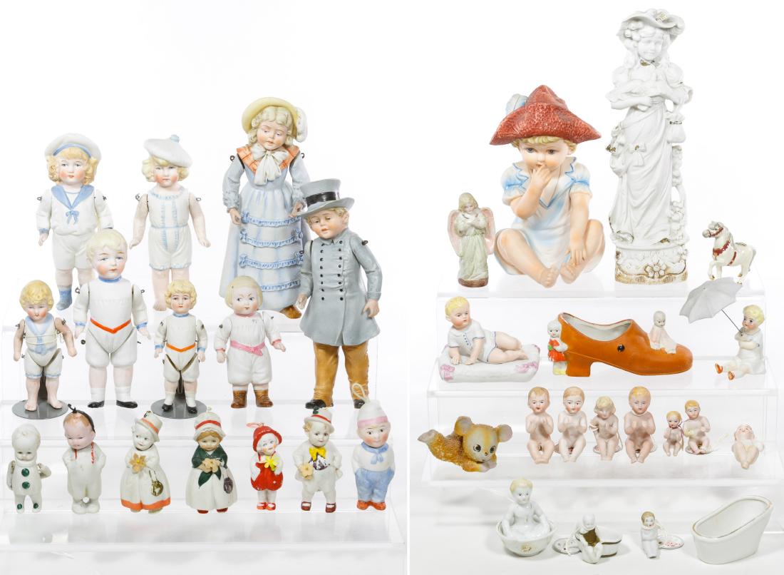 German All Bisque Doll and Figurine Assortment: German All Bisque Doll and Figurine Assortment Including dolls with molded clothes and hats, bathtub and piano babies, nodders and figurines; some marked Germany, most unmarked Height: 10.00 inches (f