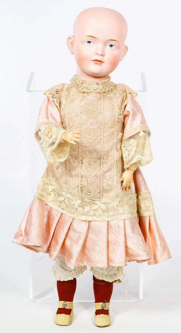 Reproduction Bruno Schmidt #529 German Bisque Head: Reproduction Bruno Schmidt #529 German Bisque Head Character Doll Having a bisque socket head with painted intaglio eyes and marked 'BSW (in a heart)' and '529' on a older composition jointed body Hei