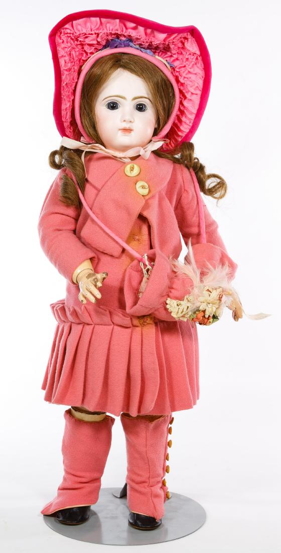 Tete Jumeau Bebe French Bisque Doll: Tete Jumeau Bebe French Bisque Doll Having a bisque socket head with closed mouth, stationary paperweight glass eyes, pierced ears, red stamp 'Depose Tete Jumeau' on back of head, jointed wrists on an