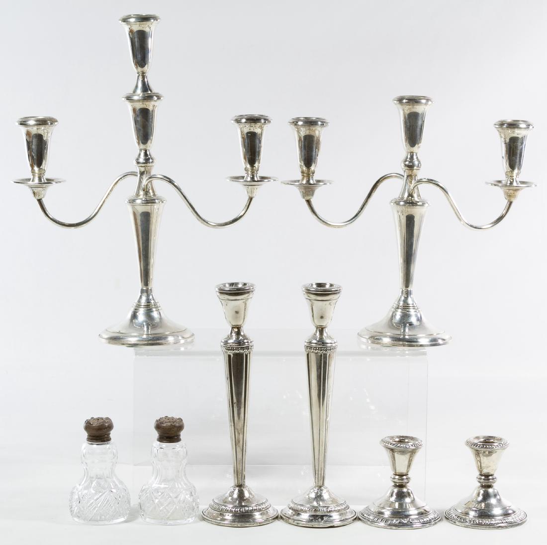 Sterling Silver Candlestick Assortment: Sterling Silver Candlestick Assortment Weighted pieces including a pair of Empire candelabras, a pair of tall candlesticks, a pair of Frank M. Whiting short candlesticks and a pair of shakers with ste