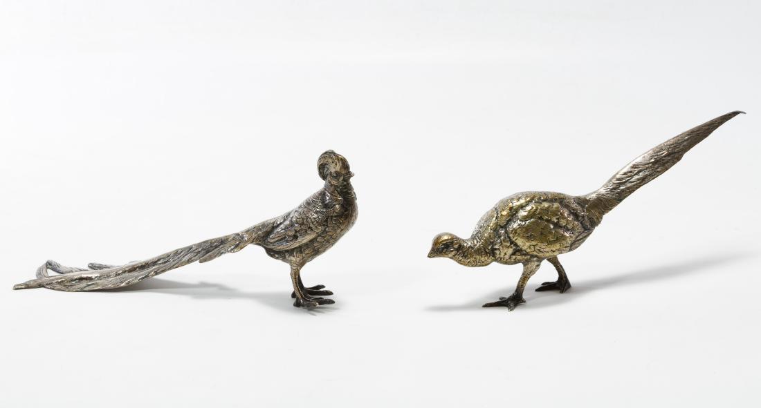 European Silver (.800) Birds: European Silver (.800) Birds Two pieces including a figurine and a shaker; both marked '800' on top side of tail Height: 3.75 inches, Length: 8.00 inches, Width: 1.75 inches Weight: 7.78 ozt. Category