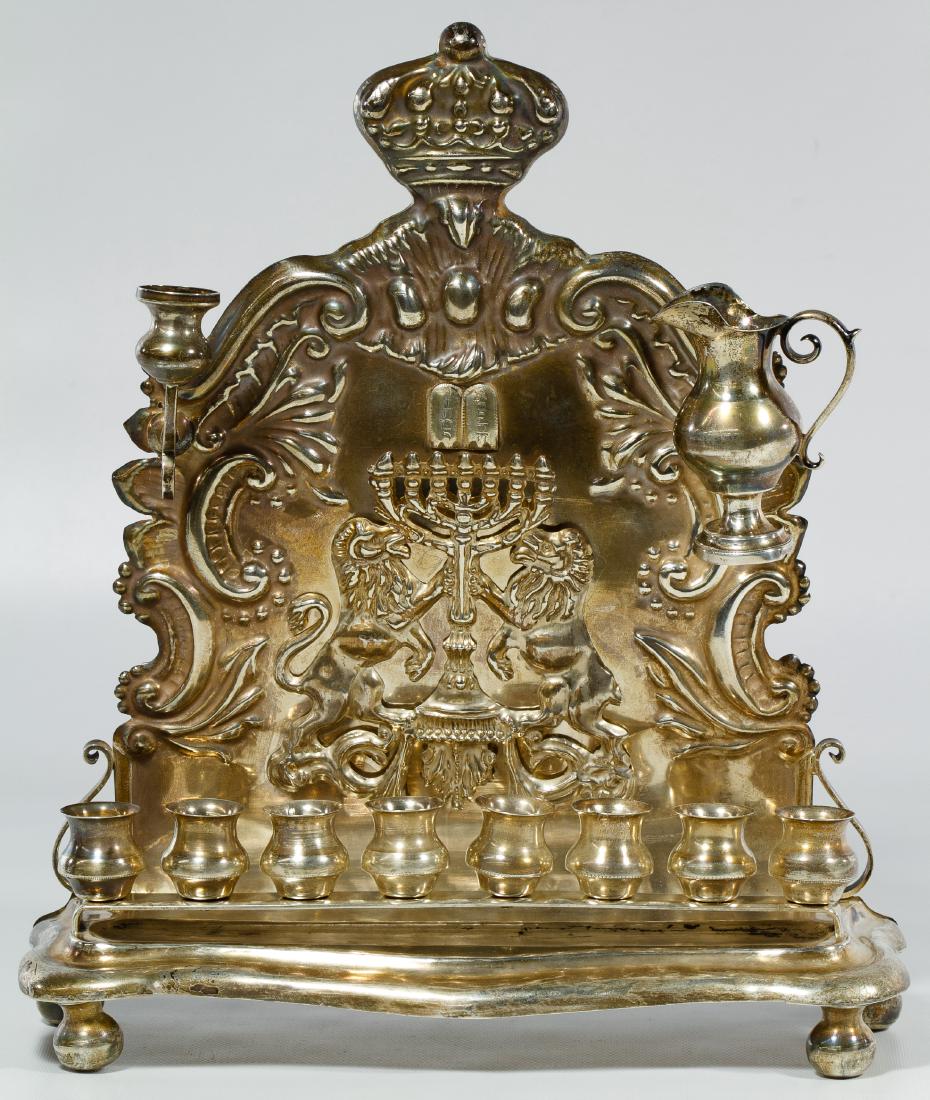 Russian Sterling Silver (.875) Menorah: Russian Sterling Silver (.875) Menorah Stamped 'S.H.' mark on the back towards the bottom, having eight candle holders on the bottom, one candle holder upper left and oil pitcher upper right; marked '