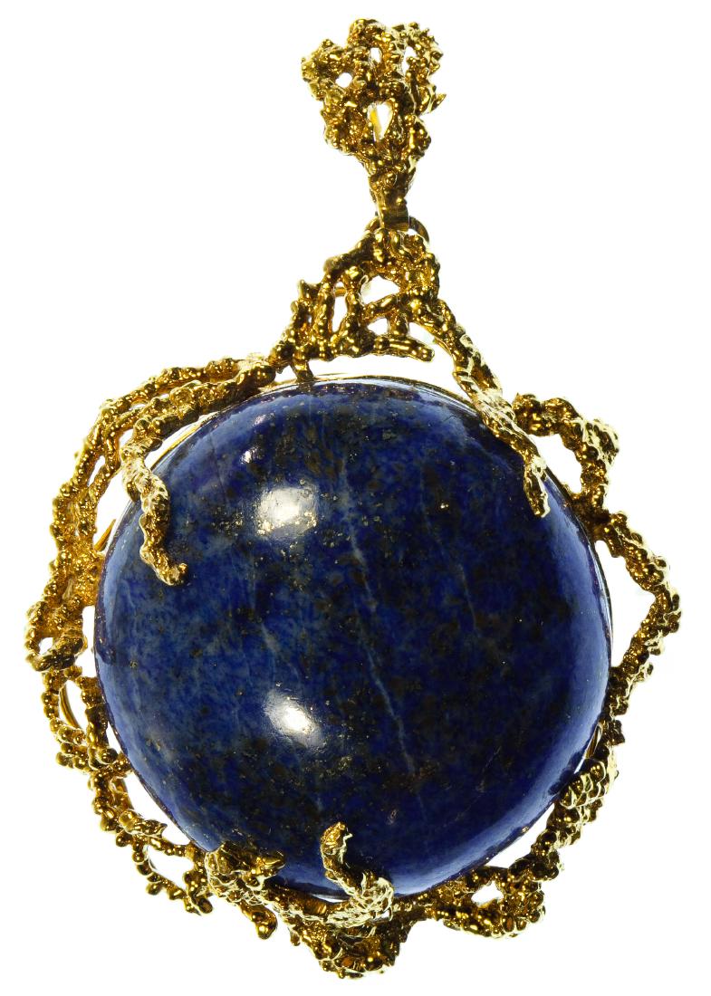 14k Gold and Lapis Lazuli Pin / Pendant: 14k Gold and Lapis Lazuli Pin / Pendant Having a 20mm round cut cabochon lapis lazuli in a branch style setting; marked '14k' on back near pin clasp Length: 2.25 inches, Width: 1.50 inches Weight: 15.