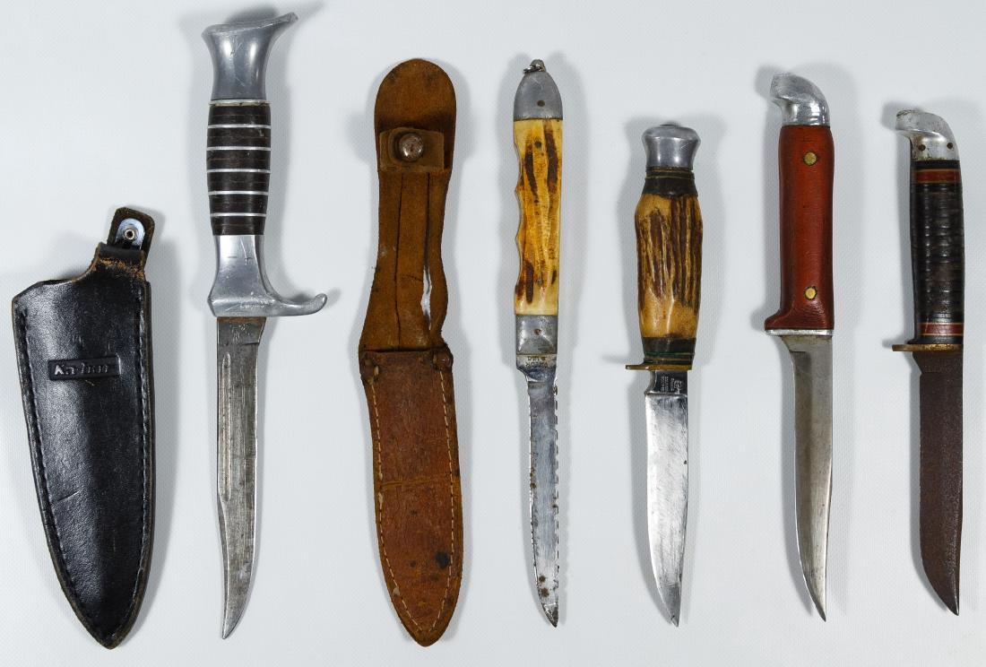 German Hunting Knife Assortment: German Hunting Knife Assortment Including a Soligen Germany 918 marked knife, a Japanese Valor #126 saw blade knife, a leather wrapped 'Western' marked knife, a Soligen Othello and a Marshall Wells Co