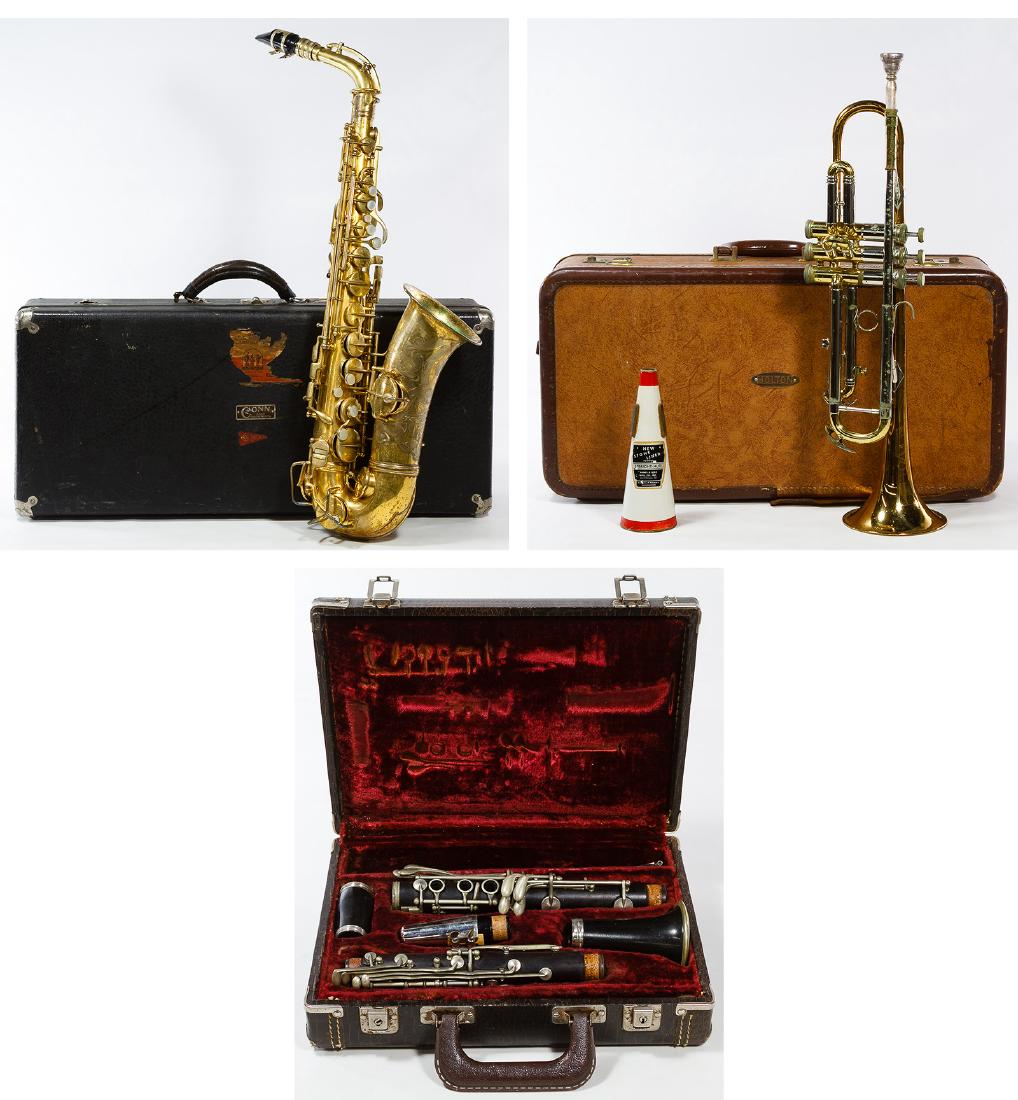 Trumpet, Clarinet and Saxaphone Assortment: Trumpet, Clarinet and Saxaphone Assortment Three items with cases including a Holton trumpet #294539 with a Vega Co. mouthpiece, Holton case and a Hume & Berg straight mute; a BC Co. Cadet clarinet #2