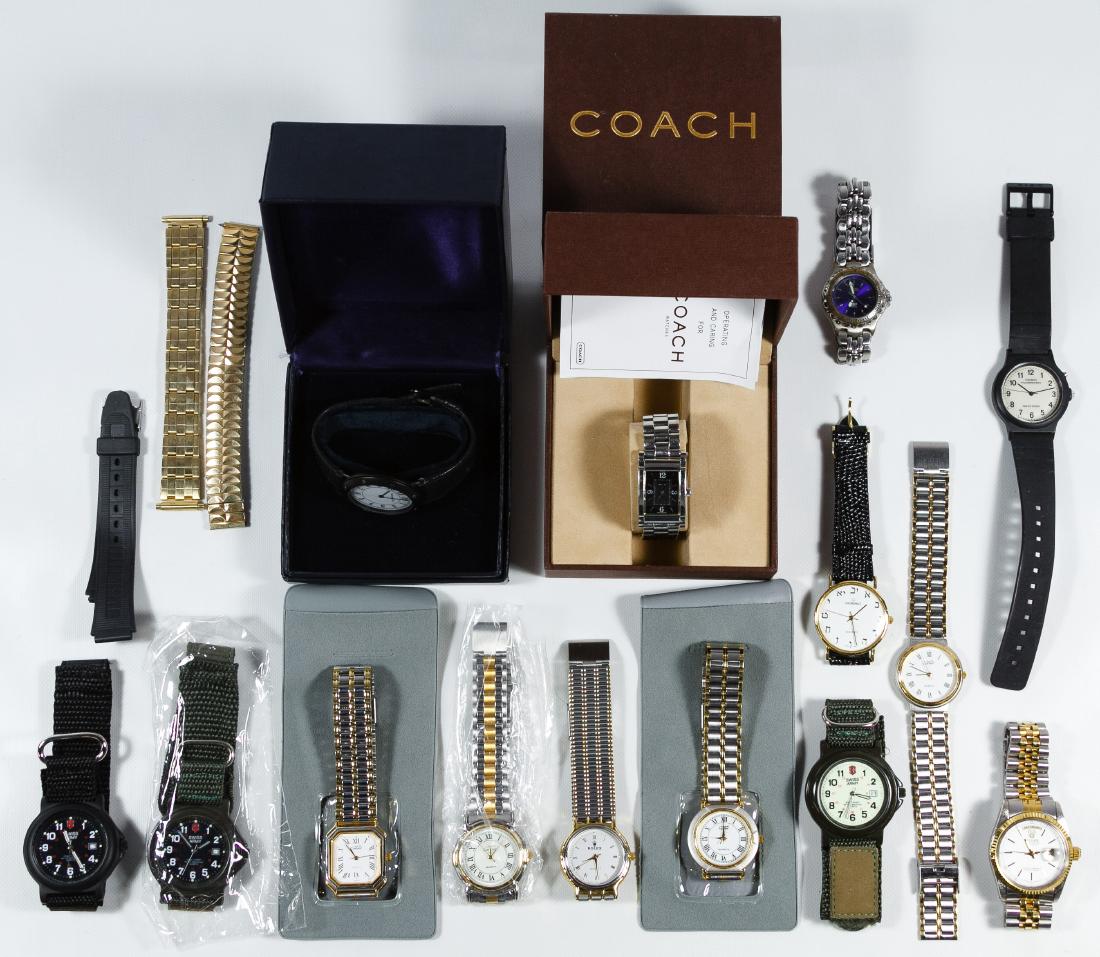 Tiffany and Coach Wrist Watches: Tiffany and Coach Wrist Watches Tiffany black wrist watch with band and case and Coach wrist watch with case; together with twelve wrist watches and two replacement bands Width: 3.75 inches (Tiffany b