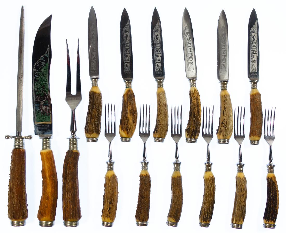 Kla-Tra-So Soligen Antler Handle Game Cutlery Set: Kla-Tra-So Soligen Antler Handle Game Cutlery Set Including a carving knife and fork with sharpening steel, (6) dinner forks and (6) dinner knives; knife blades having etched Black Forest animal desig