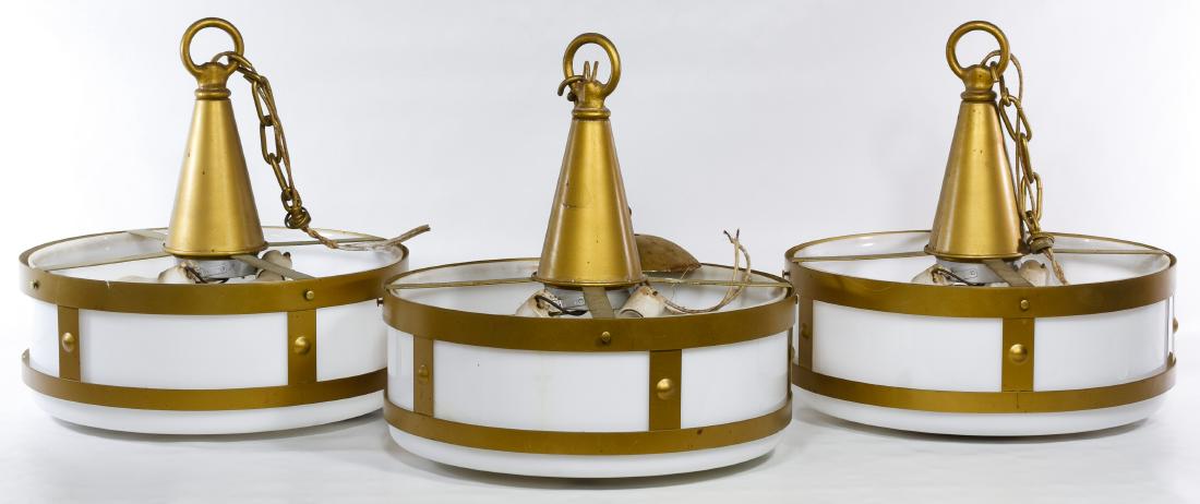 Architectural Lamps: Architectural Lamps Three ceiling fixtures having white glass cylinders inside a cast metal frame painted gold and each having three lights; together with ceiling caps Height: 17.00 inches, Diameter: 