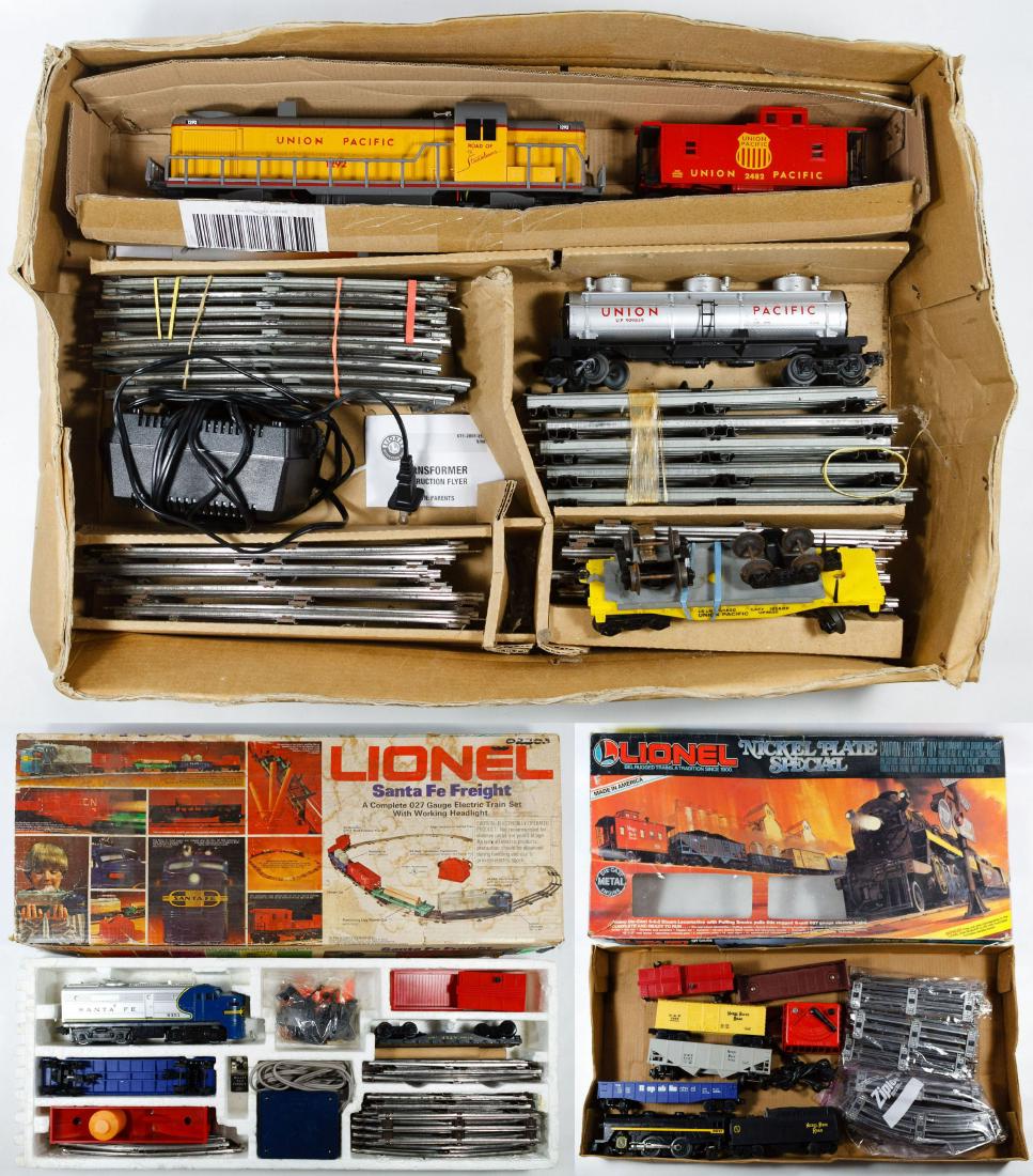 Lionel Toy Model Train Assortment: Lionel Toy Model Train Assortment (3) boxes including one with the O-scale Union Pacific engine 1292, caboose 2482, tank 9859, a transformer and track; a 027 gauge Santa Fe Freight boxed set #6-1383 a