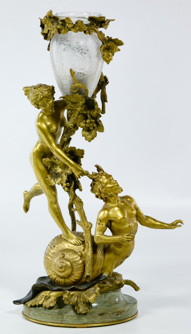 (After) Charles George Ferville Suan (French,: (After) Charles George Ferville Suan (French, 1847-1925) 'Nymph and Satyr' Figural Gilt Metal Lamp Undated, incised signature on shell, depicting a nude female and a half man half snail creature; moun