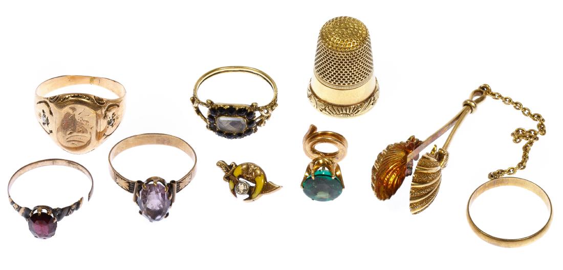 14k and 10k Gold Jewelry Assortment: 14k and 10k Gold Jewelry Assortment 14k including mourning ring having woven hair, thimble, skirt clip having attached ring and screw-back shirt stud as well as 10k including (3) rings and a lapel pin
