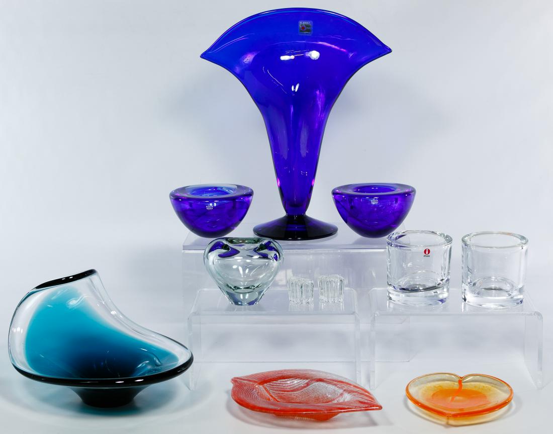 Signed Art Glass Assortment: Signed Art Glass Assortment Eleven pieces including Blenko blue fan vase, (2) Kosta Boda blue bowls, (2) iittala clear votives, (2) iittala small clear candle holders, a signed clear heart-shaped vase