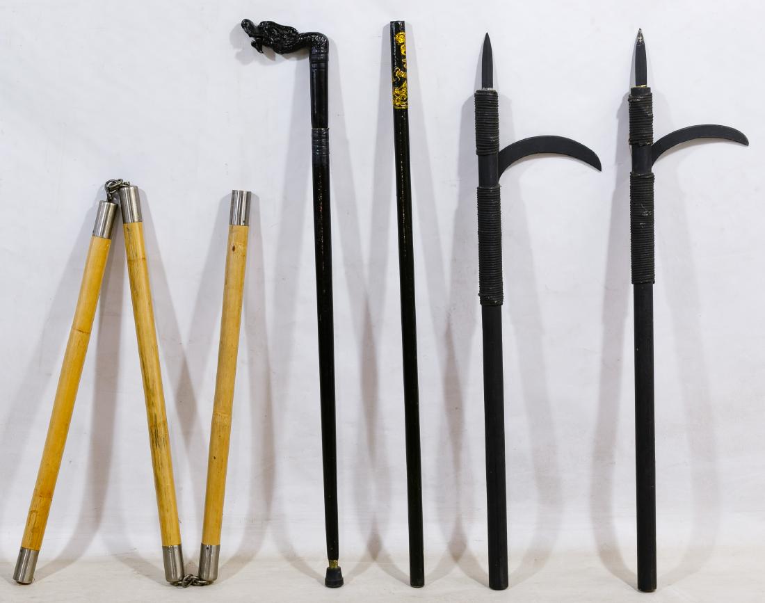 Asian Martial Arts Training Gear Assortment: Asian Martial Arts Training Gear Assortment (5) contemporary items including an Asian gilt dragon pole, two pikes, a three-piece chain pole and a Chinese dragon handle cane Height: 37.00 inches (cane)