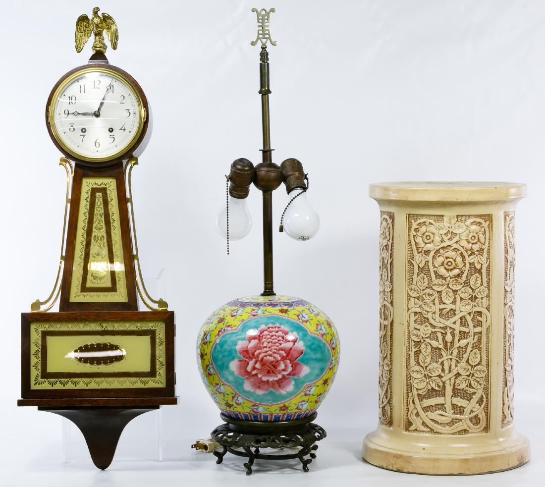 Decorative Object Assortment: Decorative Object Assortment Three items including a Weller style lamp base, a Seth Thomas wall clock with key and pendulum and an Asian ceramic table lamp Height: 28.50 inches, Width: 9.75 inches, De