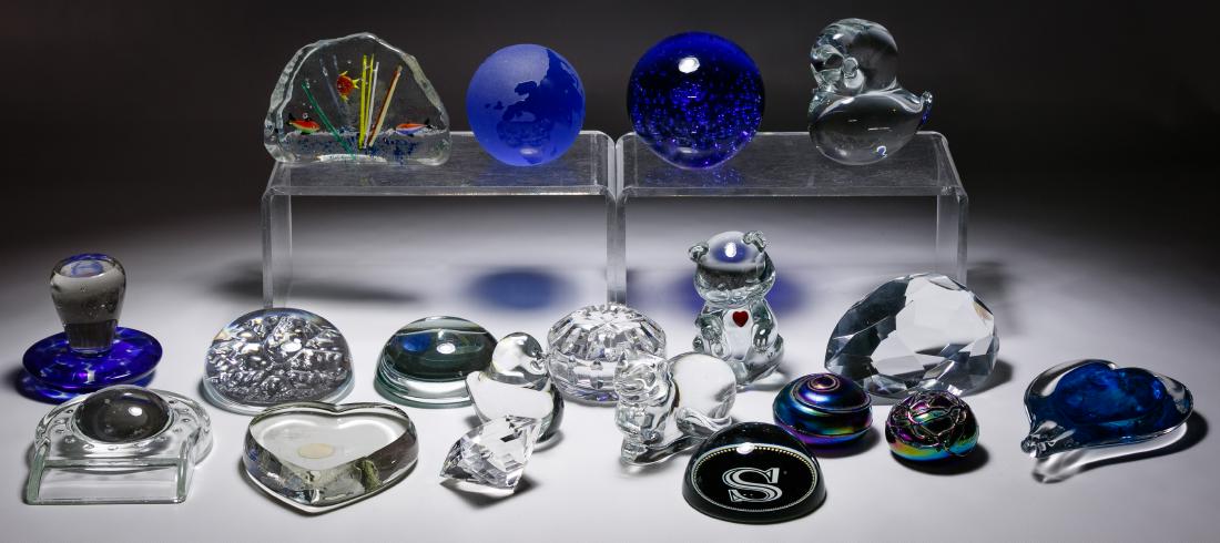 Art Glass Paperweight Assortment: Art Glass Paperweight Assortment Including (16) glass paperweights and (2) magnifying glass objects with examples from Oleg Cassini, Atlantis, Daum, Anton Intaglio and Fostoria Height: 5.50 inches, Wi