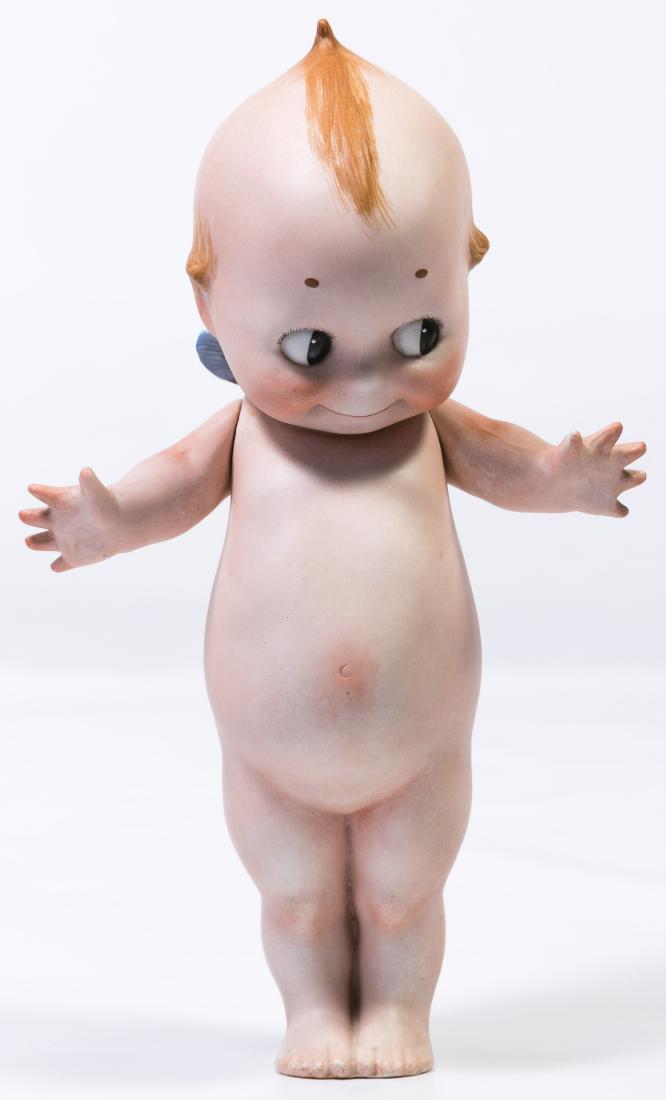 Rosie O'Neill Bisque Kewpie Doll: Rosie O'Neill Bisque Kewpie Doll Having the incised O'Neill mark on underside of right foot, jointed shoulders, blue wings and painted side glancing eyes Height: 12.00 inches Category: Collectibles > 