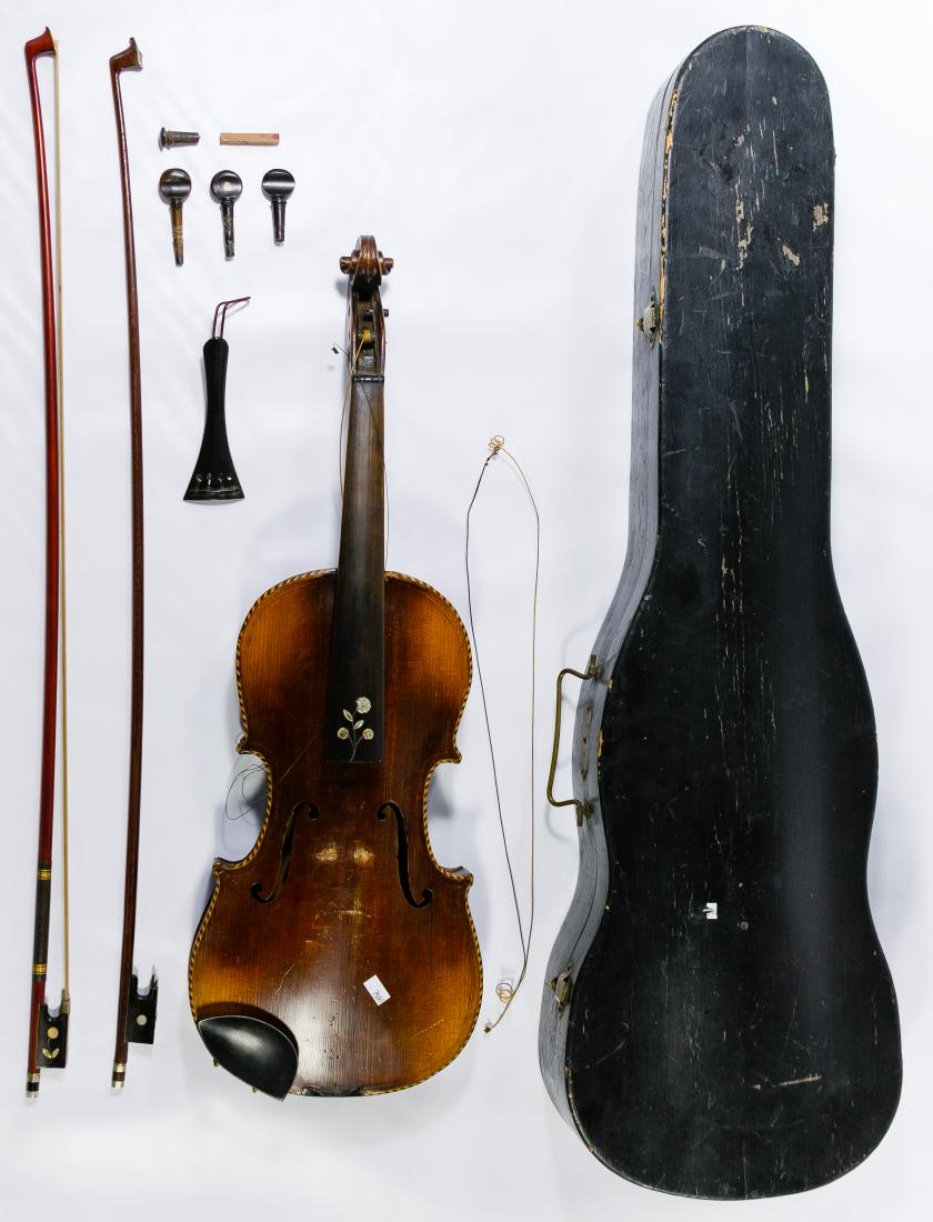 Nikolaus Amati Copy Violin: Nikolaus Amati Copy Violin c.1900, produced in Germany, attached label on the inside, mother of pearl inlay on the front and back; together with two bows one marked 'Nippon,' accessories and wood case