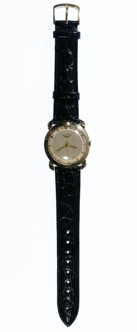 Longines 14k Gold Case 'LXW 22LS' Wrist Watch: Longines 14k Gold Case 'LXW 22LS' Wrist Watch Serial #8354623 having 17-jewel movement; on a genuine leather band by Hadley-Roma; marked '14k' inside back cover Length: 6.00 inches (adjustable to 7.75