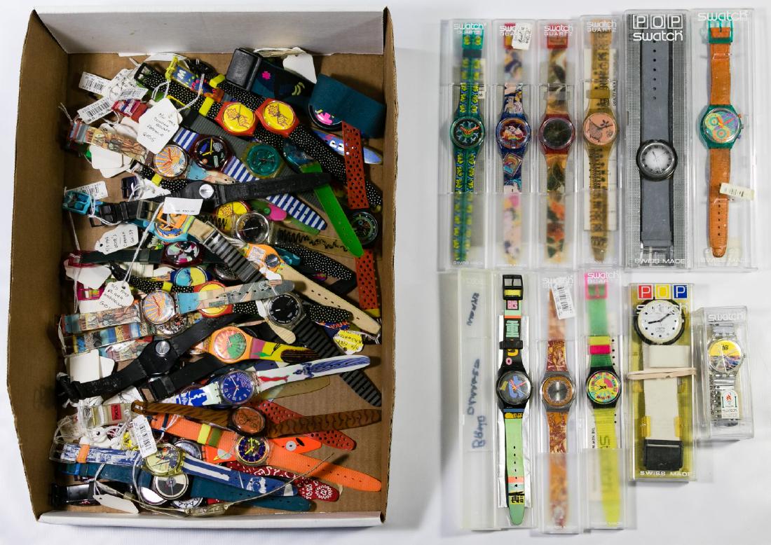 Swatch Wrist Watch Assortment: Swatch Wrist Watch Assortment Fifty-six watches including (10) in original packaging and (46) out of the packaging; many identified by name; together with an extra band Length: 9.75 inches, Width: 2.5