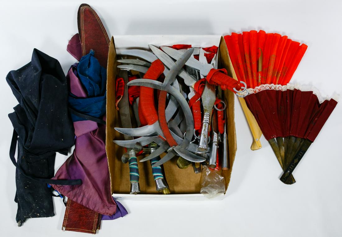 Asian Martial Arts Dagger and Fan Assortment: Asian Martial Arts Dagger and Fan Assortment Including (22) contemporary fans, daggers, spear points and multi-blade weapons and cloth sheaths; used for theatrical purposes Length: 17.00 inches (longe