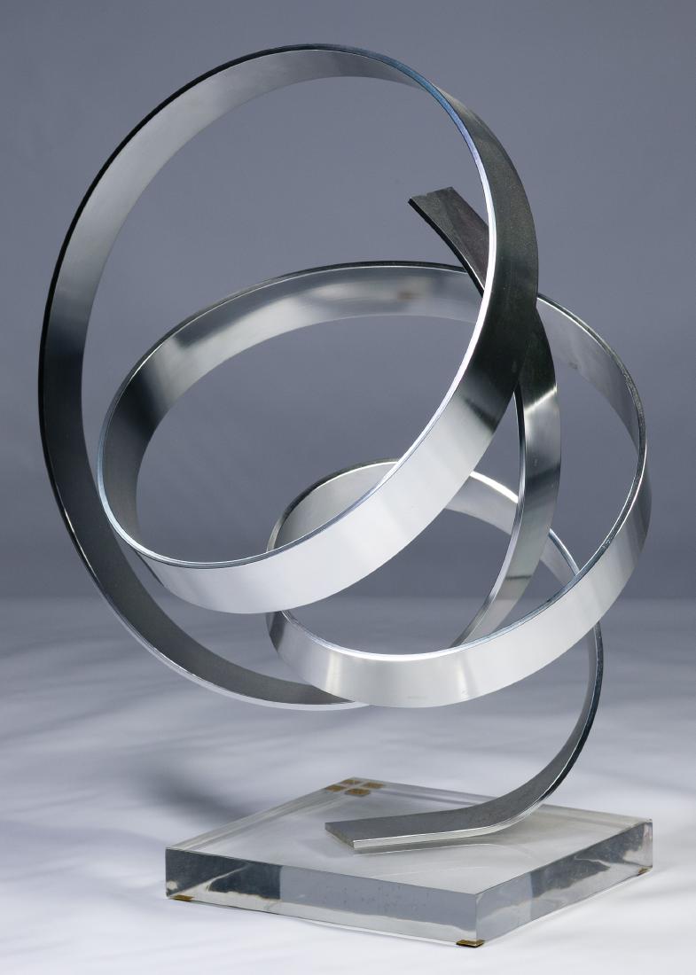 Dan Murphy (American, 20th Century) Sculpture: Dan Murphy (American, 20th Century) Sculpture 1979, etched signature on the metal, abstract aluminum form mounted on a acrylic base Height: 16.00 inches, Width: 13.00 inches, Depth: 11.00 inches Categ