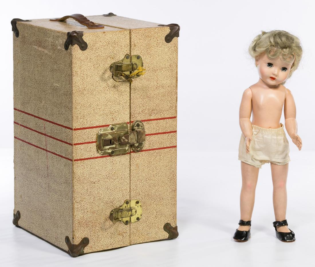 Effanbee Hard Plastic Doll, Clothing and Wardrobe Trunk: Effanbee Hard Plastic Doll, Clothing and Wardrobe Trunk c.1960, including a blonde sleep eye doll, a dozen outfits, two coats and accessories with a wardrobe trunk for storage Height: 14.00 inches (do