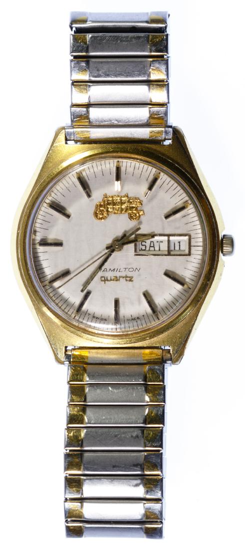 Hamilton Gold Filled Case Wrist Watch: Hamilton Gold Filled Case Wrist Watch Quartz watch for 25-year Fisher Body service anniversary Length: 7.25 inches (stretchable) Category: Watches > Men's Wrist Watches Shipping Status: Leonard Auctio