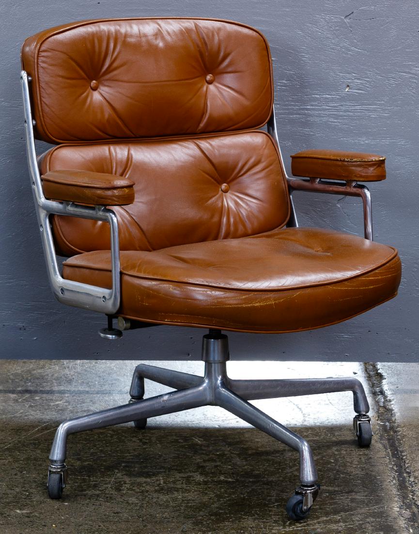 MCM 'Time Life' Chair by Charles Eames for Herman: MCM 'Time Life' Chair by Charles Eames for Herman Miller Having tufted light brown leather upholstery on swivel metal base with four casters; Herman Miller paper label underneath seat Condition: Good,
