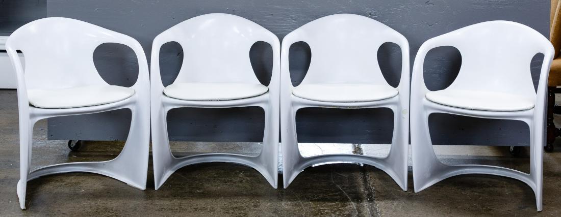 MCM White Chairs by Alexander Begge for Casala: MCM White Chairs by Alexander Begge for Casala Set of four molded plastic stacking armchairs having seat pads Condition: Poor, white paint peeling off, some stains, seat pads cracked and taped togethe