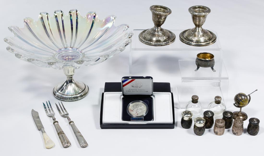 Sterling Silver Hollowware Assortment: Sterling Silver Hollowware Assortment Most weighted; including a footed glass bowl, salt cellar, pair of low candlesticks, nine individual shakers, two oyster forks, a butter knife, a globe and a 1991