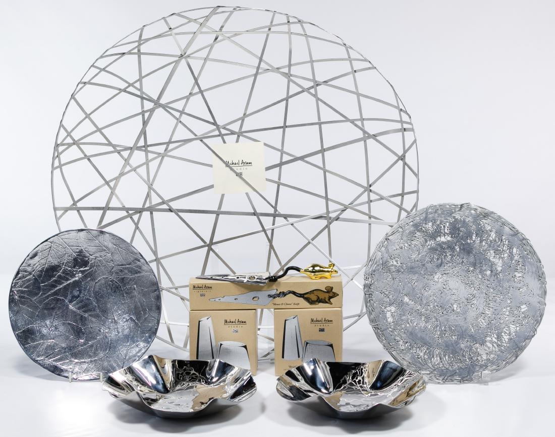 Michael Aram Tableware Assortment: Michael Aram Tableware Assortment Ten items including two sets of silver-plated salt and pepper shakers entitled 'Boats' with original boxes and packaging, an aluminum plate entitled 'Scribble Plate'