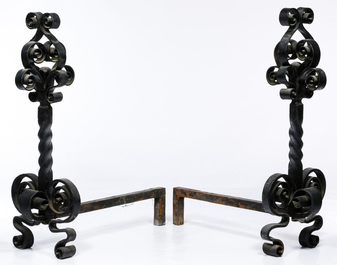 Arts and Crafts Metal Andirons: Arts and Crafts Metal Andirons Pair of black wrought iron andirons, scroll-form decorative elements with twisted shaft Condition: Very Good, minor rust on the arms Height: 23.00 inches, Width: 20.00 i
