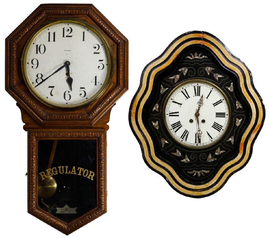 Wood Cased Wall Clocks: Wood Cased Wall Clocks Waterbury Clock Co Regulator Eight-Day Twelve Inch Heron having pendulum and key; label on back partially intact; oak with brass pendulum; original label inside pendulum area re