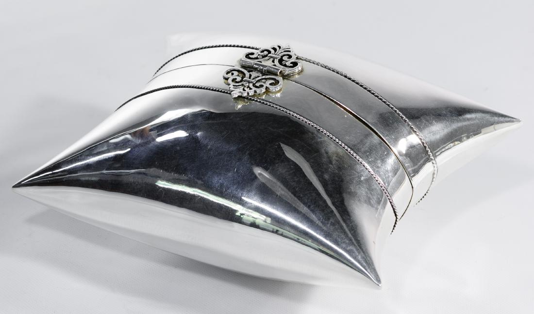 Sterling Silver Judaica Pillow-Shaped Etrog Box: Sterling Silver Judaica Pillow-Shaped Etrog Box Having a twisted rope band and gold wash interior; marked '925' on back near hinge; includes receipt from the Mae and George Bariff Shop Condition: Very