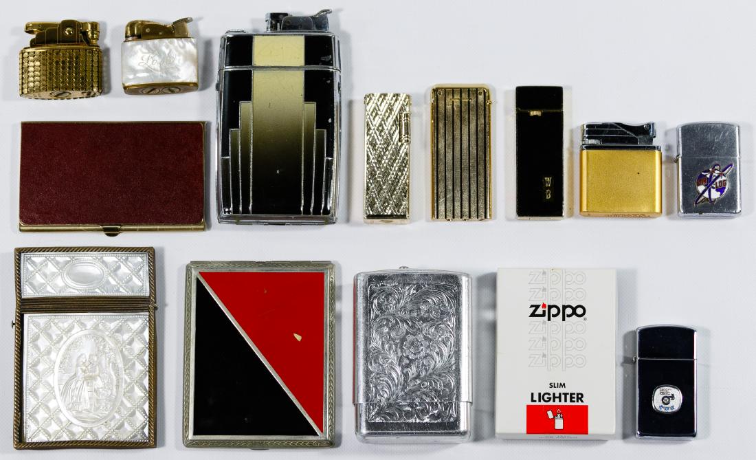 Lighter and Cigarette Case Assortment: Lighter and Cigarette Case Assortment Including black and gold slim Ronson lighter engraved 'W.B.', silver Zippo lighter in original box with 'Safety Award emblem and three pale blue stones; gold slim