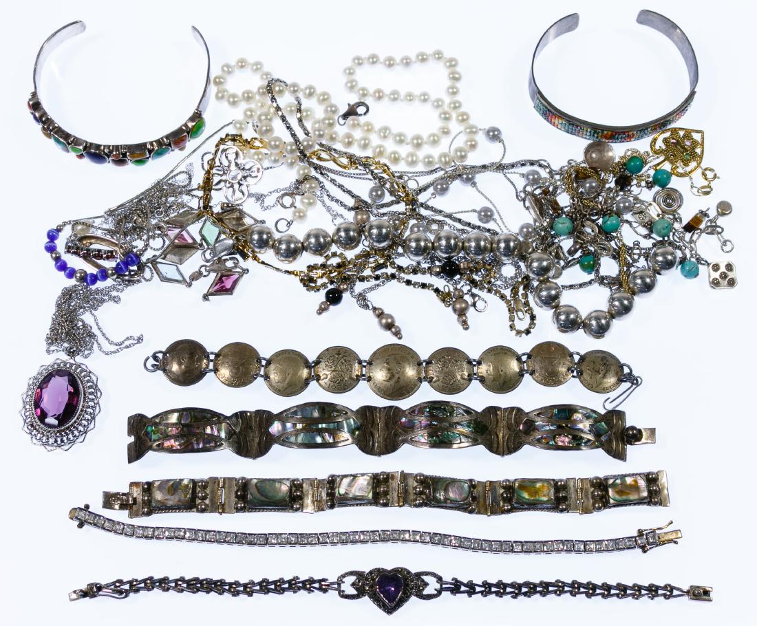 Sterling Silver Jewelry Assortment: Sterling Silver Jewelry Assortment Including two cuff bracelets, eleven chain bracelets and twelve necklaces with some having pendants; some jewelry adorned with stones / gemstones; most marked 'sterl