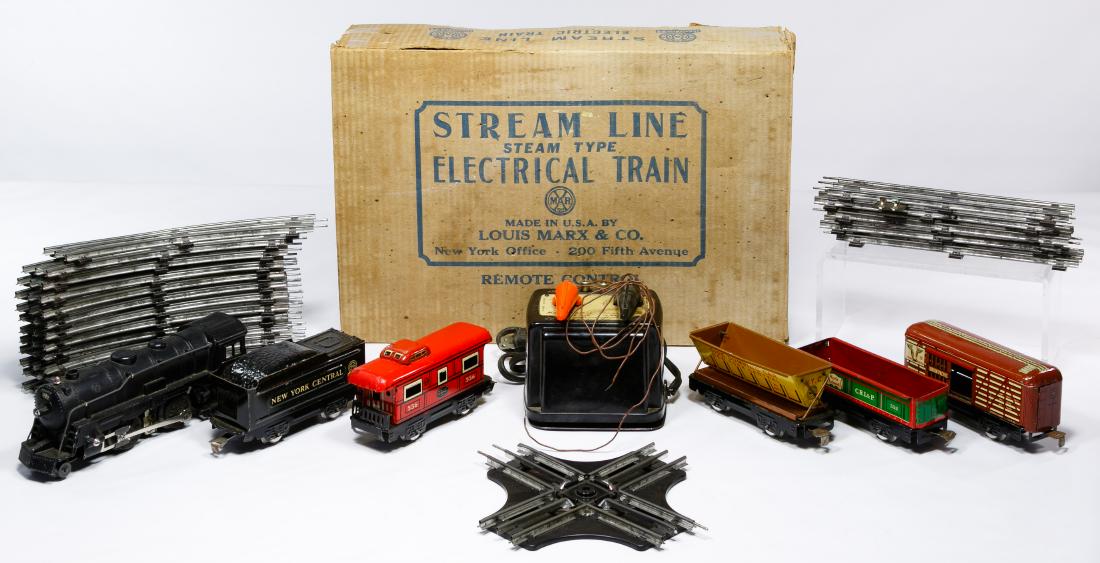 Marx Pre-War Toy Train O-Gauge Set: Marx Pre-War Toy Train O-Gauge Set Six cars including, #999 engine, N.Y.C. wedge tender, #59 Union Pacific stock car, #567 N.Y.C. side dump car, #552 C.R.I.&P. gondola, and #556 N.Y.C. caboose, tracks