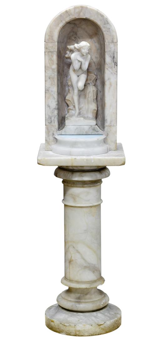 (Attributed to) Vittorio Caradossi (Italian, 1861-1918): (Attributed to) Vittorio Caradossi (Italian, 1861-1918) Carved Marble Bathing Beauty Undated, signed towards the base of sculpture, also inscripted 'Florenz', sculpture featuring a bathing beauty and